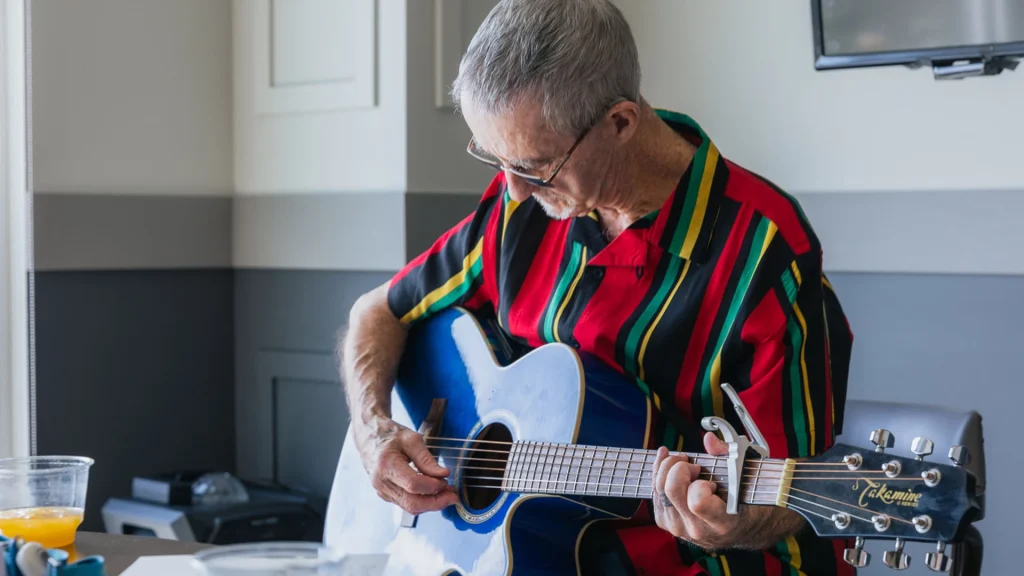 man playing guitar