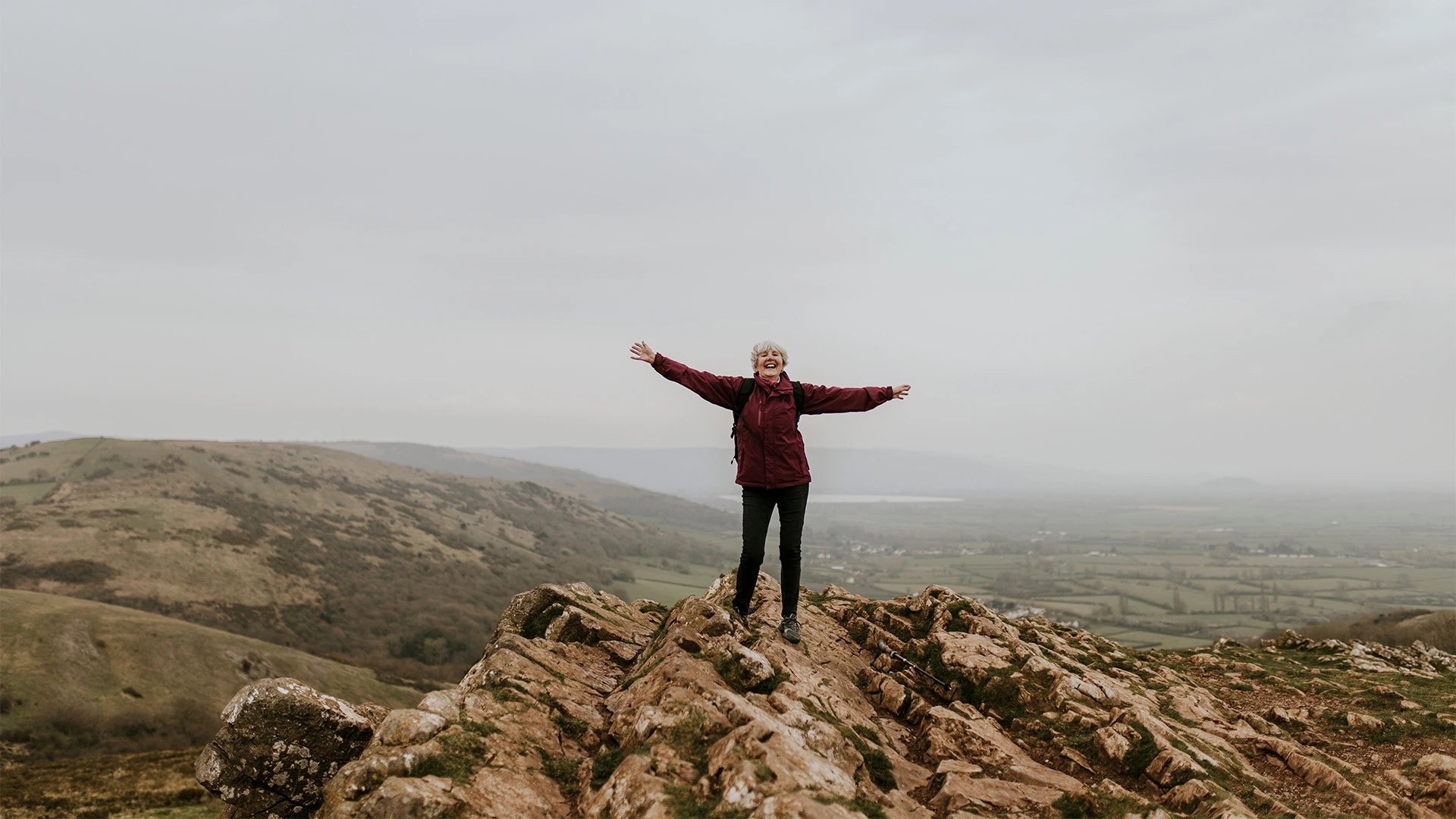 woman hiking a mountain