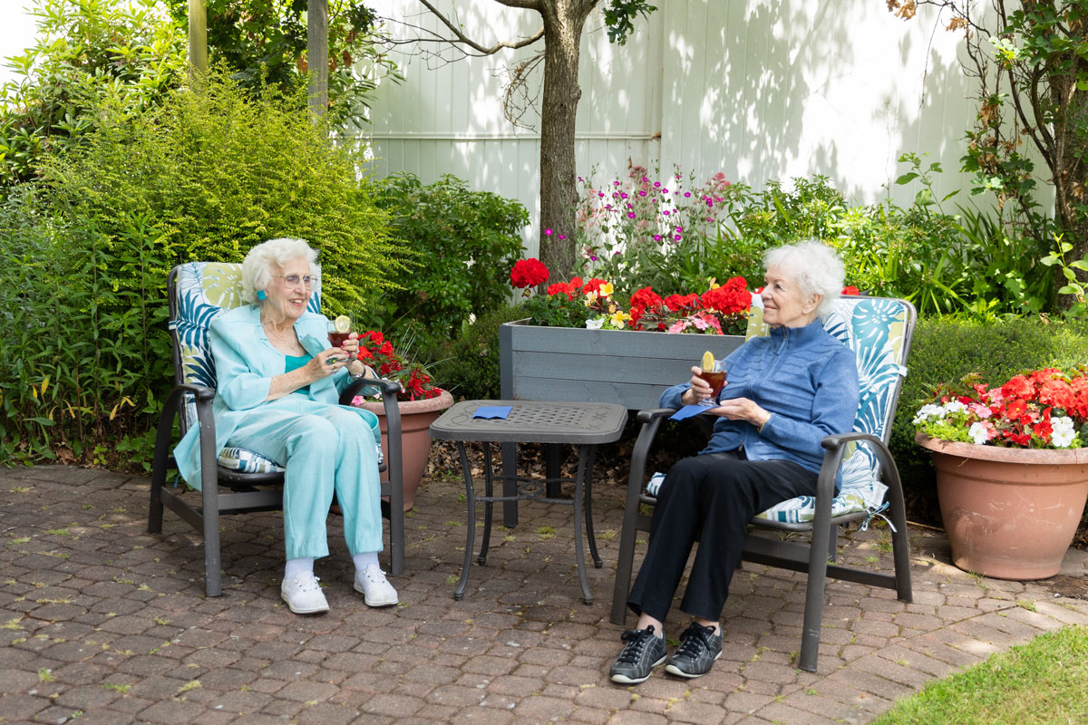 residents drinking tea outside